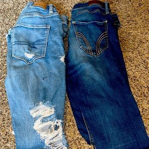Two pairs of jeans, American eagle and holister.